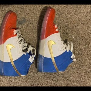 Size 12 red white and blue Nike high tops
